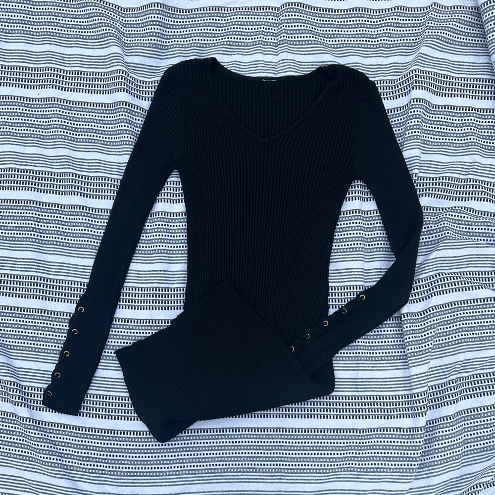 Sweater dress with rivet laced sleeves